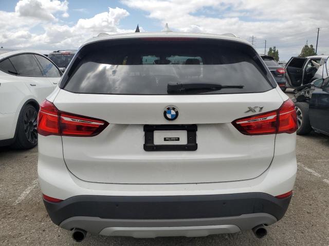 Photo 5 VIN: WBXHU7C33H5H34402 - BMW X1 