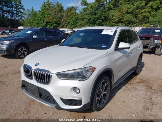 Photo 1 VIN: WBXHU7C33H5H35470 - BMW X1 