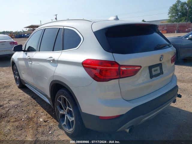 Photo 2 VIN: WBXHU7C33H5H35470 - BMW X1 