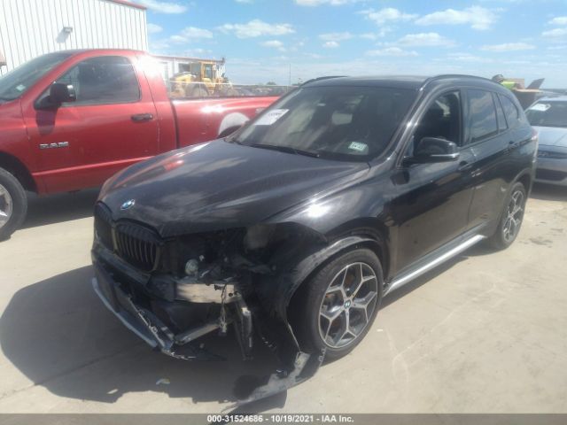 Photo 1 VIN: WBXHU7C33H5H37994 - BMW X1 