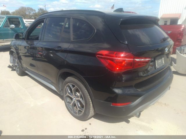 Photo 2 VIN: WBXHU7C33H5H37994 - BMW X1 