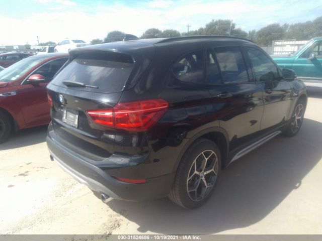 Photo 3 VIN: WBXHU7C33H5H37994 - BMW X1 