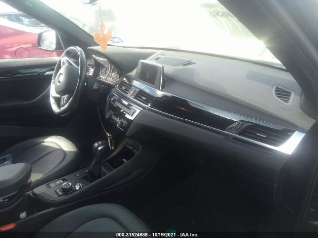 Photo 4 VIN: WBXHU7C33H5H37994 - BMW X1 