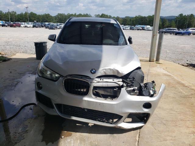 Photo 4 VIN: WBXHU7C33H5H38045 - BMW X1 SDRIVE2 