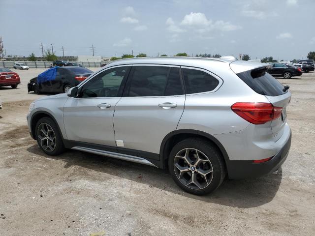 Photo 1 VIN: WBXHU7C33J3F04683 - BMW X1 