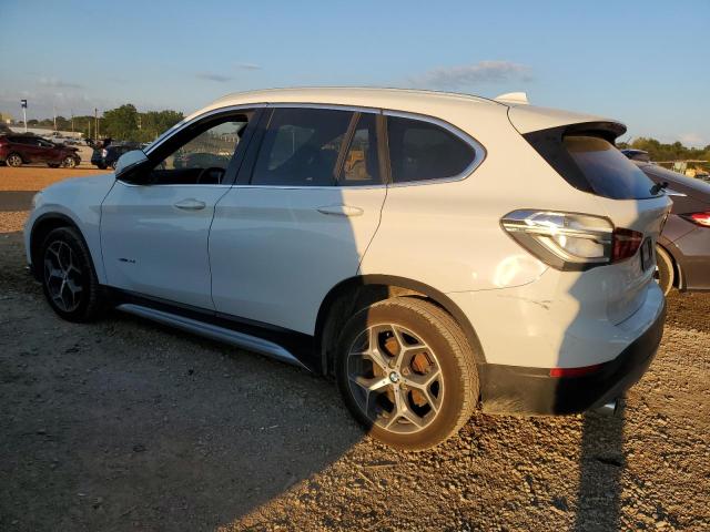 Photo 1 VIN: WBXHU7C33J5H40397 - BMW X1 SDRIVE2 