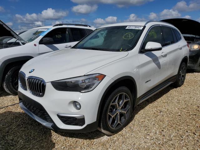 Photo 1 VIN: WBXHU7C33J5H40951 - BMW X1 SDRIVE2 