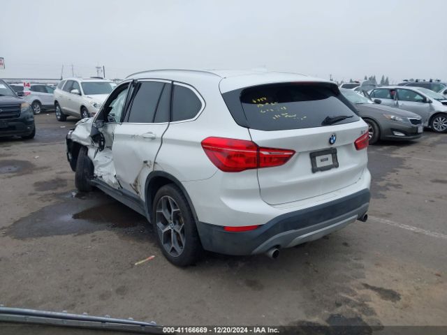 Photo 2 VIN: WBXHU7C33J5H41419 - BMW X1 