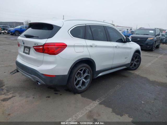 Photo 3 VIN: WBXHU7C33J5H41419 - BMW X1 