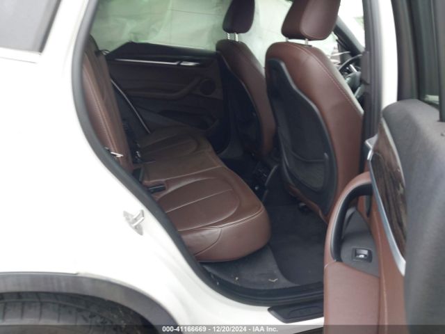 Photo 7 VIN: WBXHU7C33J5H41419 - BMW X1 