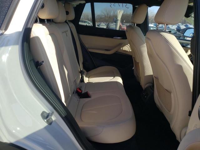 Photo 10 VIN: WBXHU7C33J5H43624 - BMW X1 