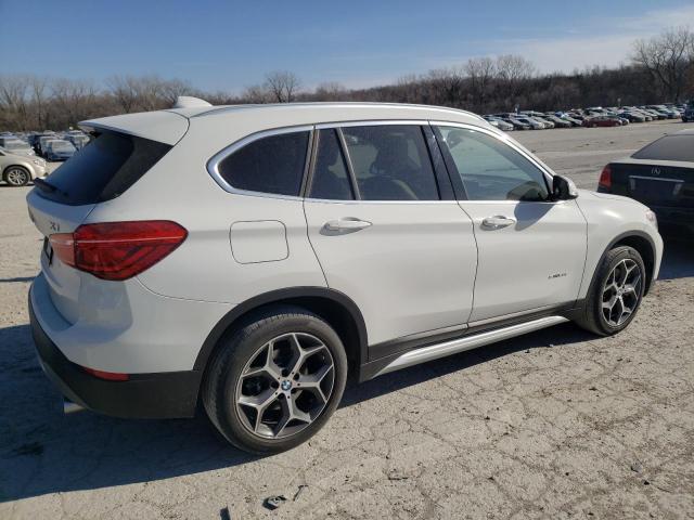 Photo 2 VIN: WBXHU7C33J5H43624 - BMW X1 