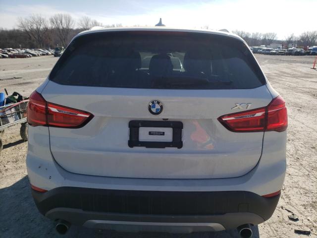 Photo 5 VIN: WBXHU7C33J5H43624 - BMW X1 