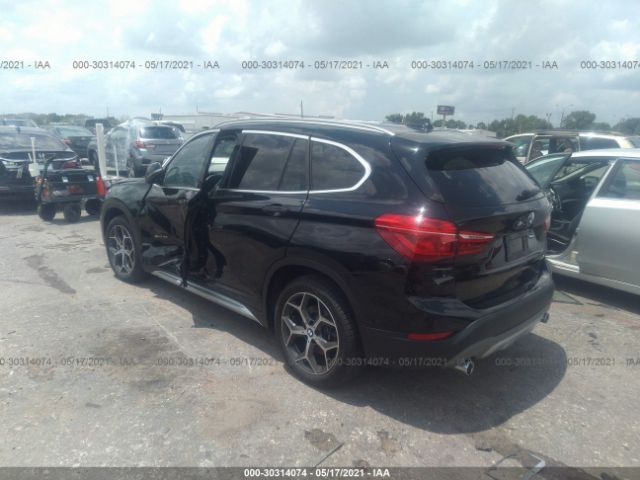 Photo 2 VIN: WBXHU7C33J5L05599 - BMW X1 