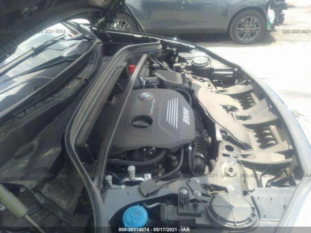 Photo 9 VIN: WBXHU7C33J5L05599 - BMW X1 