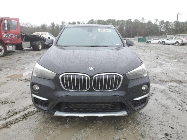 Photo 4 VIN: WBXHU7C33J5L06574 - BMW X1 