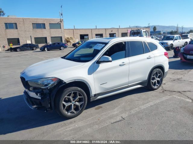 Photo 1 VIN: WBXHU7C34H5H32688 - BMW X1 