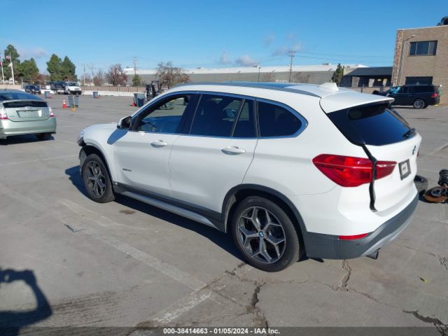 Photo 2 VIN: WBXHU7C34H5H32688 - BMW X1 