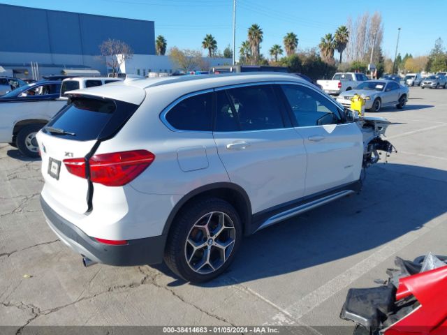 Photo 3 VIN: WBXHU7C34H5H32688 - BMW X1 