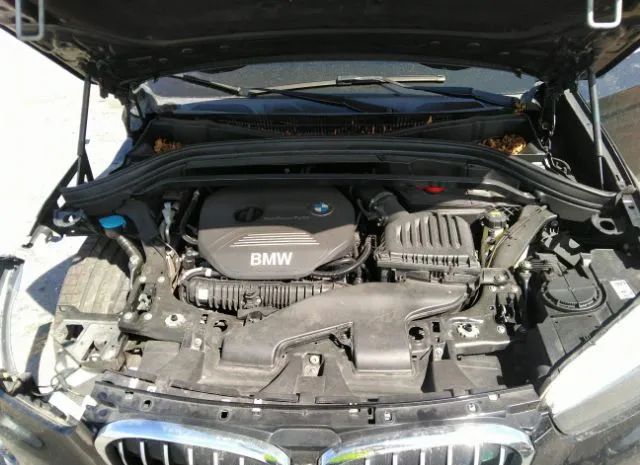 Photo 9 VIN: WBXHU7C34H5H34005 - BMW X1 