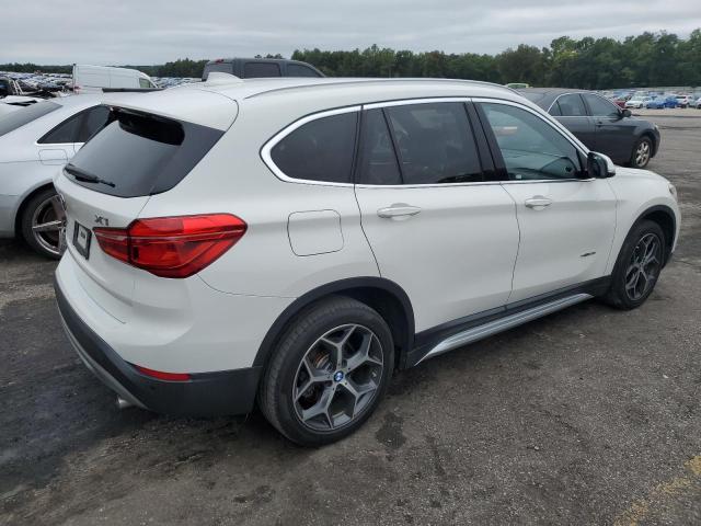 Photo 2 VIN: WBXHU7C34H5H34442 - BMW X1 