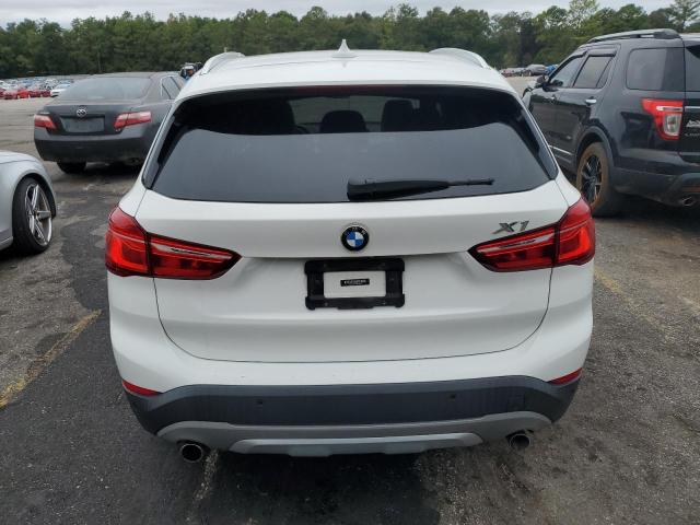 Photo 5 VIN: WBXHU7C34H5H34442 - BMW X1 