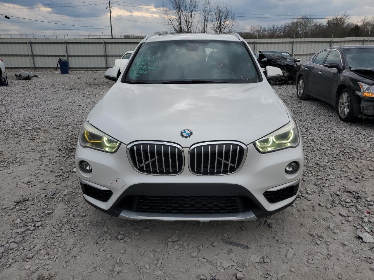 Photo 4 VIN: WBXHU7C34H5H35963 - BMW X1 