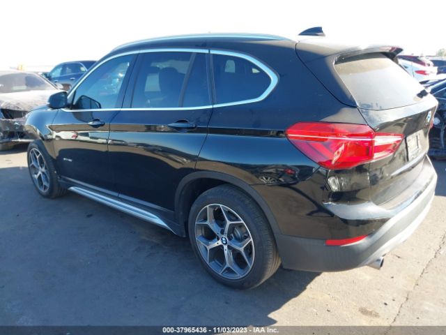 Photo 2 VIN: WBXHU7C34H5H36191 - BMW X1 