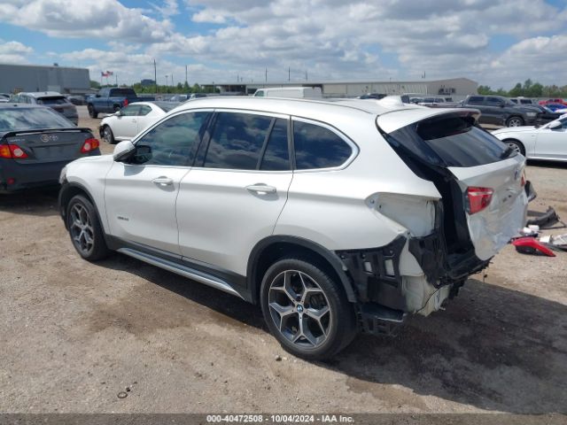 Photo 2 VIN: WBXHU7C34H5H37454 - BMW X1 