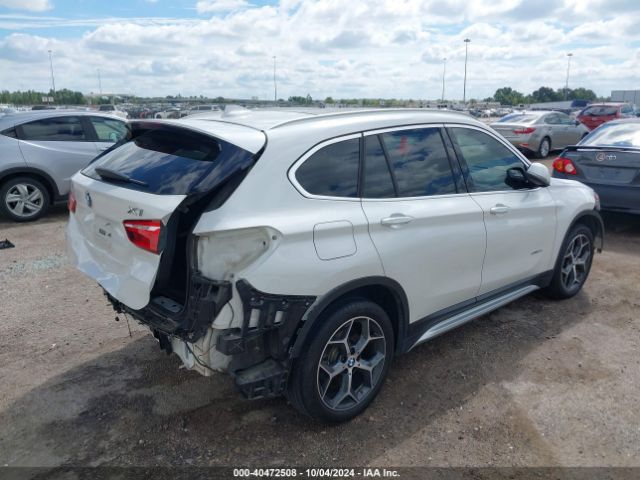 Photo 3 VIN: WBXHU7C34H5H37454 - BMW X1 