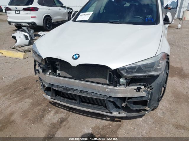 Photo 5 VIN: WBXHU7C34H5H37454 - BMW X1 