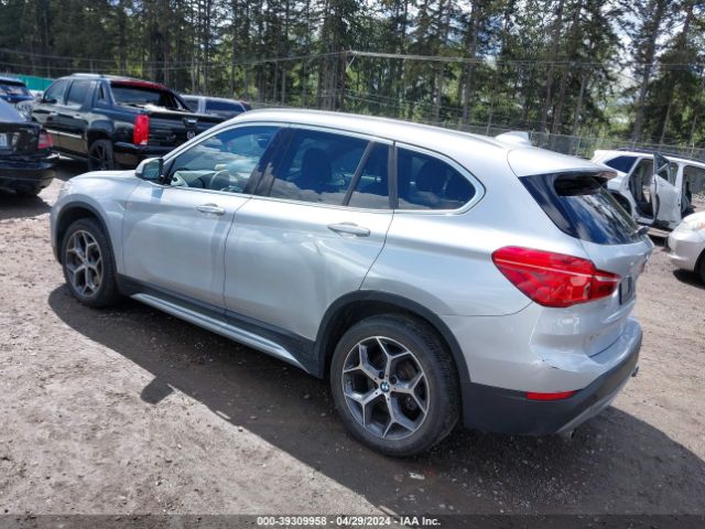 Photo 2 VIN: WBXHU7C34J3H43224 - BMW X1 