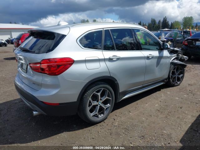 Photo 3 VIN: WBXHU7C34J3H43224 - BMW X1 