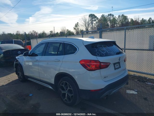 Photo 2 VIN: WBXHU7C34J3H43823 - BMW X1 