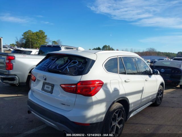 Photo 3 VIN: WBXHU7C34J3H43823 - BMW X1 