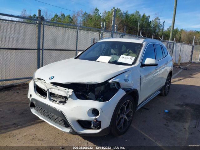 Photo 5 VIN: WBXHU7C34J3H43823 - BMW X1 