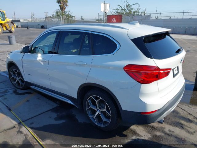 Photo 2 VIN: WBXHU7C34J5H41378 - BMW X1 