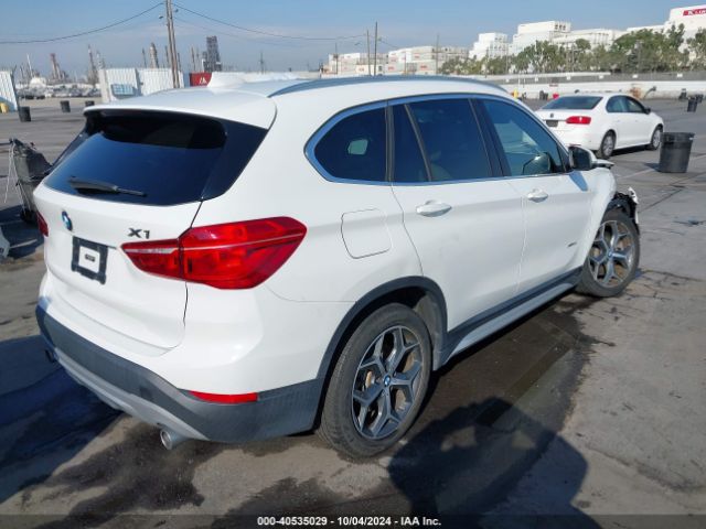 Photo 3 VIN: WBXHU7C34J5H41378 - BMW X1 