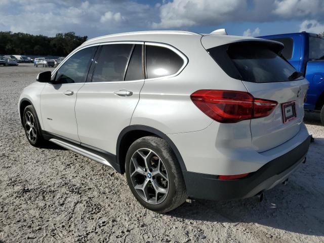 Photo 1 VIN: WBXHU7C34J5H41977 - BMW X1 SDRIVE2 