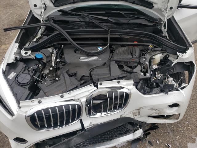 Photo 11 VIN: WBXHU7C34J5H44071 - BMW X1 