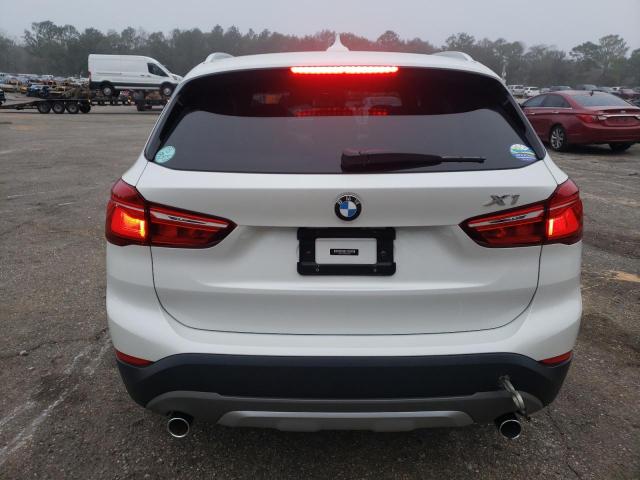 Photo 5 VIN: WBXHU7C34J5H44071 - BMW X1 