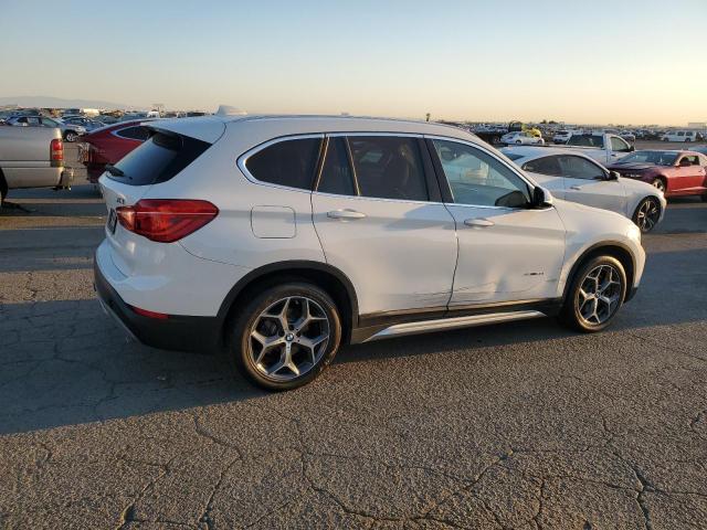 Photo 2 VIN: WBXHU7C34J5H45768 - BMW X1 SDRIVE2 