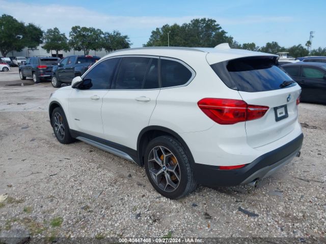 Photo 2 VIN: WBXHU7C34J5L05109 - BMW X1 