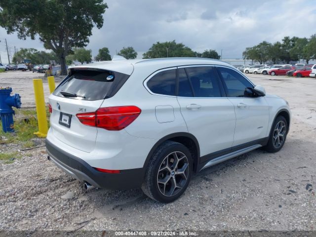 Photo 3 VIN: WBXHU7C34J5L05109 - BMW X1 