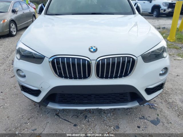 Photo 5 VIN: WBXHU7C34J5L05109 - BMW X1 