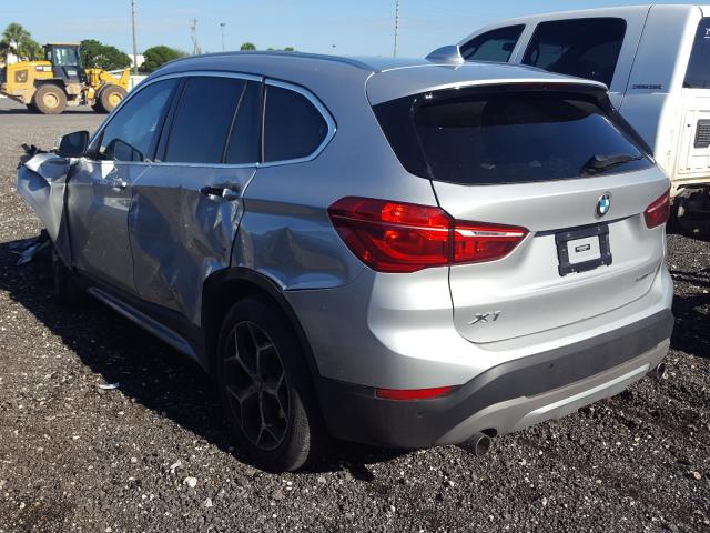 Photo 2 VIN: WBXHU7C34J5L08897 - BMW X1 