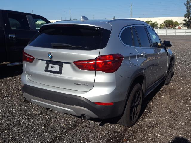 Photo 3 VIN: WBXHU7C34J5L08897 - BMW X1 