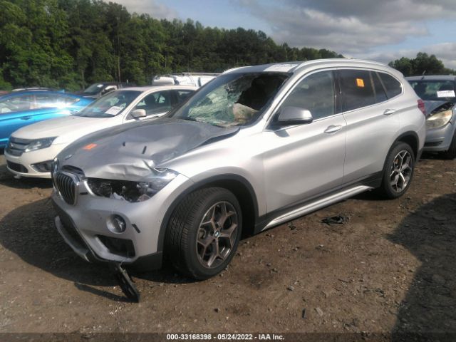 Photo 1 VIN: WBXHU7C34J5L09791 - BMW X1 