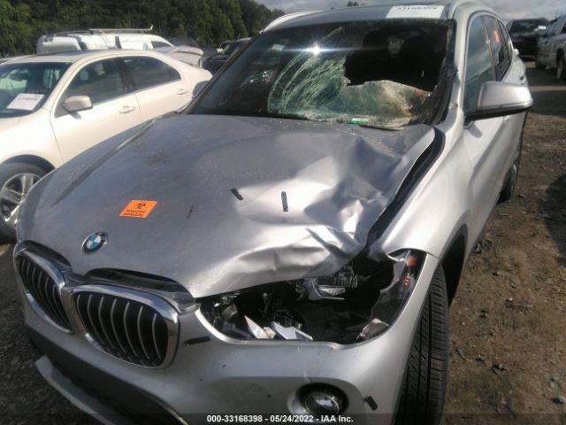 Photo 5 VIN: WBXHU7C34J5L09791 - BMW X1 