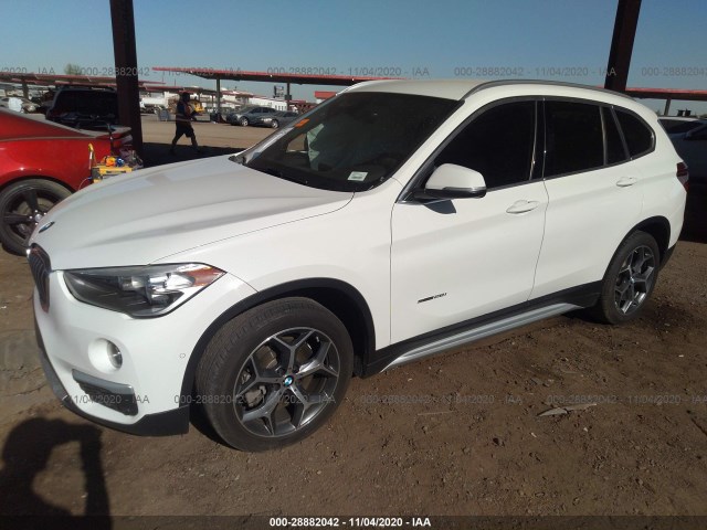 Photo 1 VIN: WBXHU7C35H5H32540 - BMW X1 